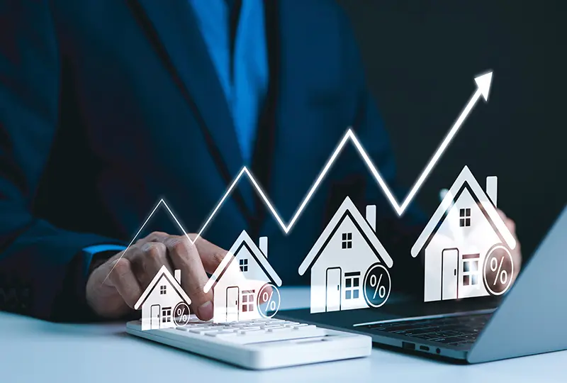 Businessman analyzing real estate market trends.